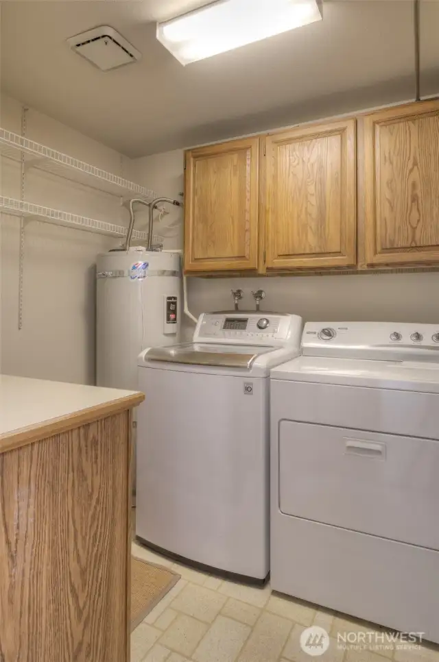 Laundry room with storage