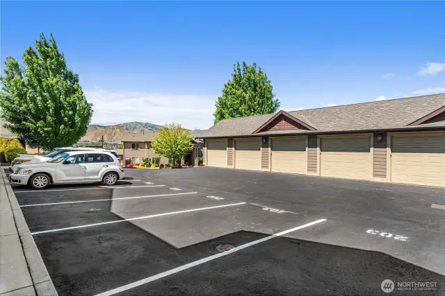 One assigned uncovered parking space