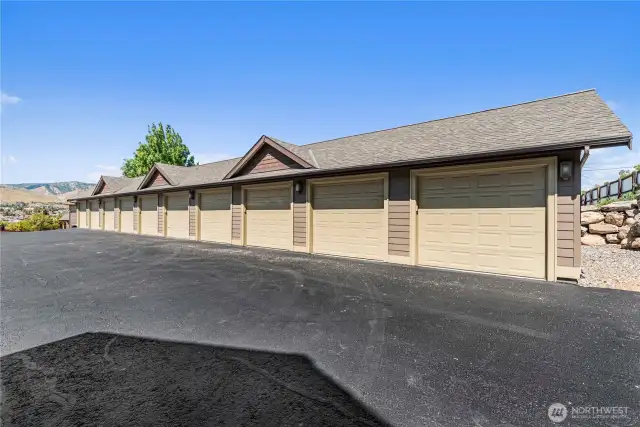 One covered parking space in private garage bay
