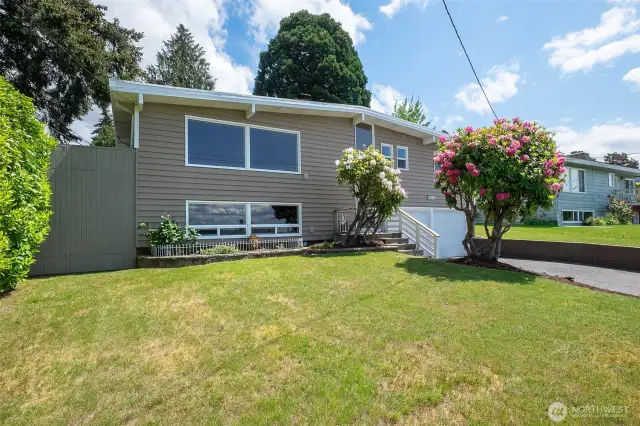 Situated above the street, this home feels private and secure.