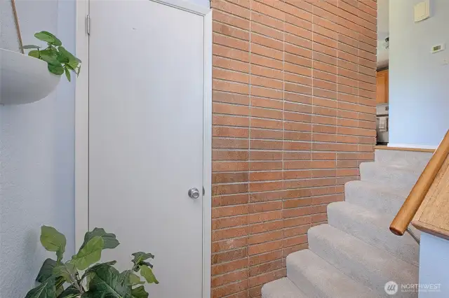 This home has a definite Midcentury vibe with large brick fireplaces.