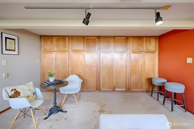 A wall of deep cabinets to store everything!