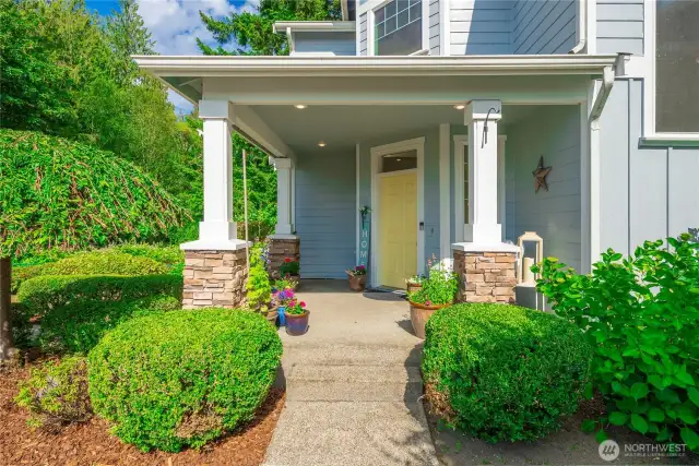 Adorable classic front porch with white pillars