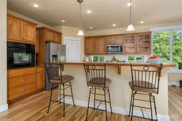 Fresh refinished hardwood floors with large walk-in pantry