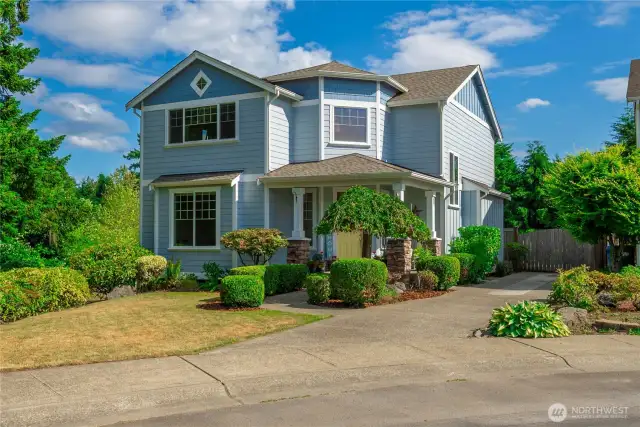 Picture perfect with easy to maintain established landscaping
