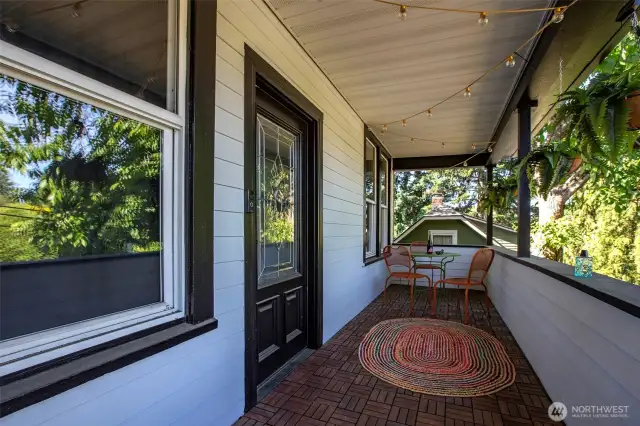 Lovely front porch recently remodeled with new new entry steps