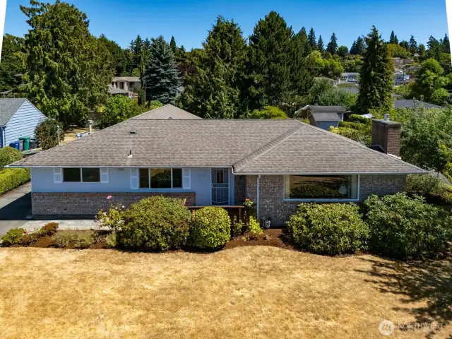 Welcome to 17958 Brittany Drive SW, a lovely rambler on a large lot with sound and mountain views.