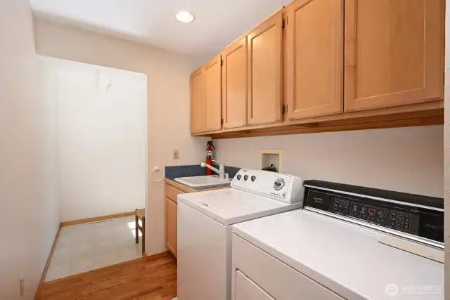 Laundry space in back hallway off kitchen and bonus room.
