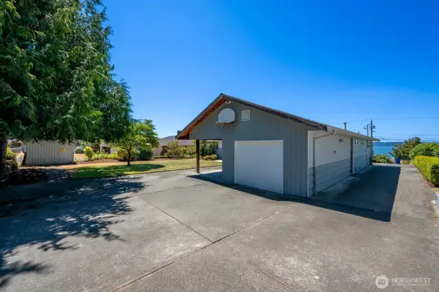 Carport and parking space for other vehicles.