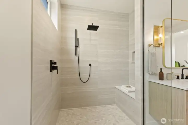 Convenient bench and handled shower feature