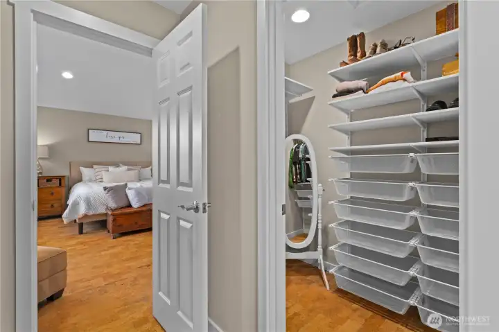 The primary walk-in closet with organizers.