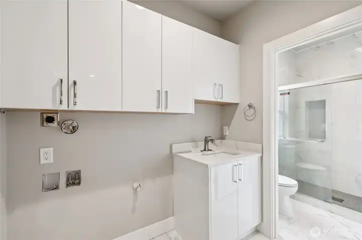 ADU laundry and bathroom.