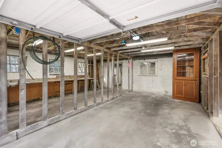 Detached garage with two separate doors. Plenty of space for workshop or storage.