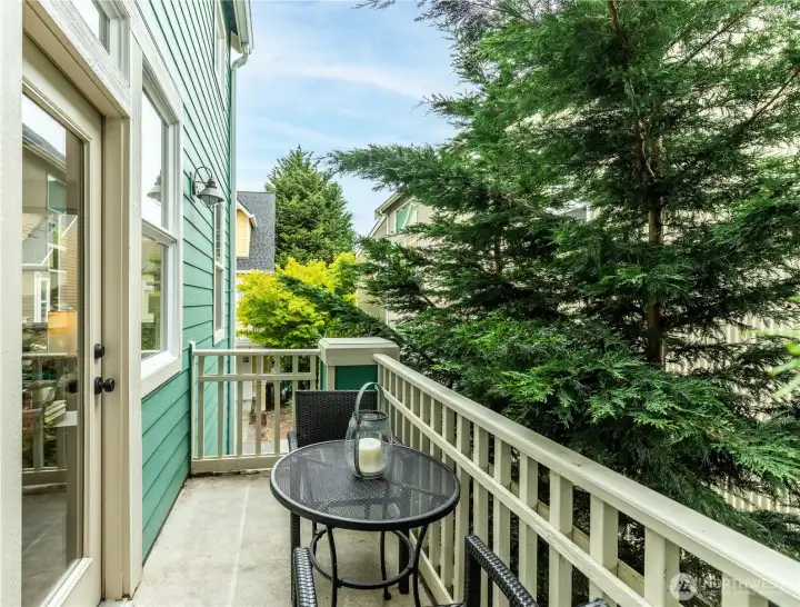 Private balcony deck off of dining and living space.