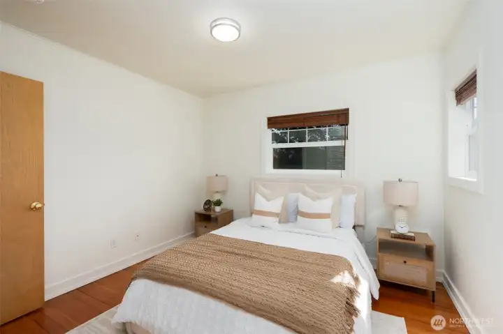 Primary bedroom fits a queen size bed nicely.