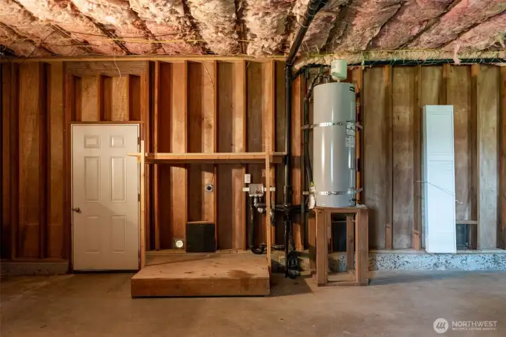 Basement is accessed from back of home. Additional Washer / dryer hook up, water heater and furnace are all located here.