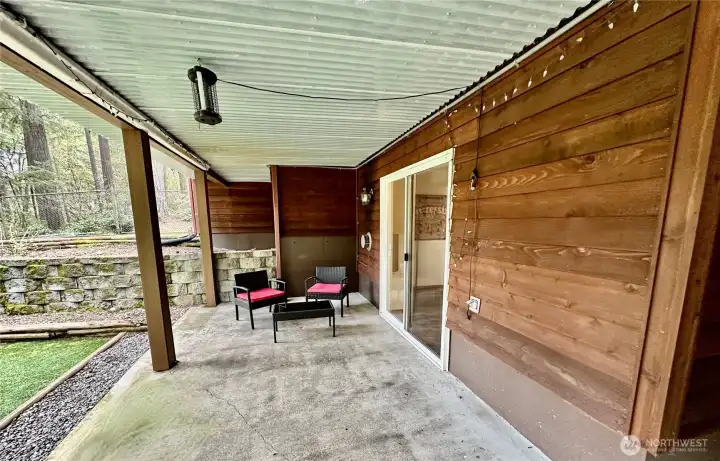 This Covered patio is located just off the rec room with easy access to the side, fenced-in yard and garage.