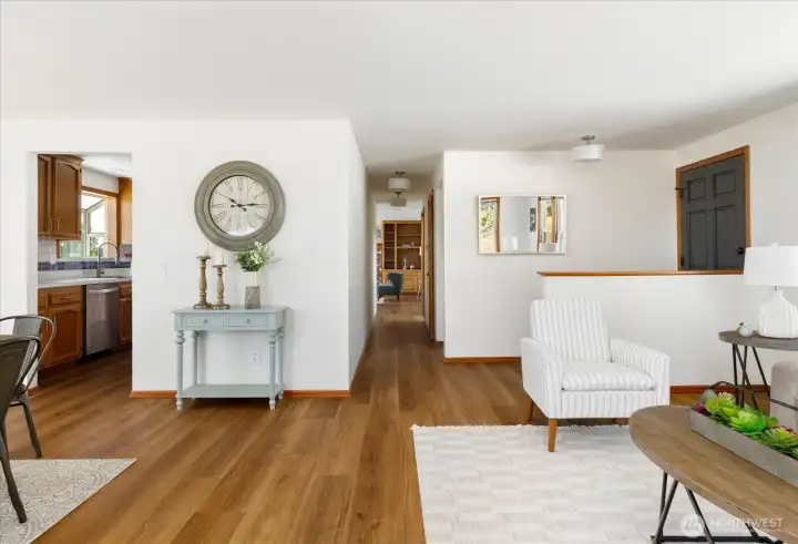 Entry to the right, hall  to the 1/2 bath, office & family room