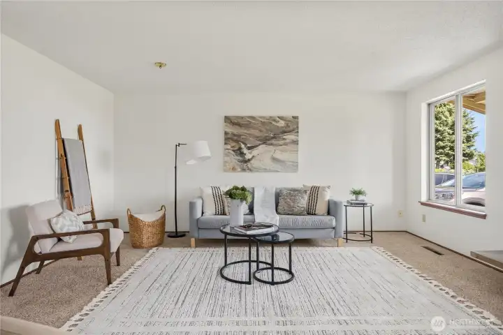 Original hardwood floors, long protected by carpeting, can be found in the living room, primary & 2nd bedroom.