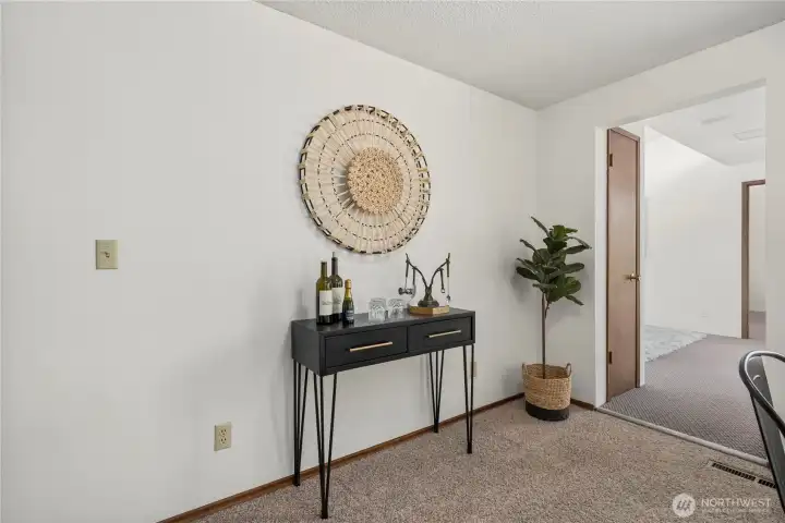 The dining room opens to the permitted addition featuring a family room and third bedroom