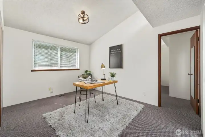 Versatile space ideal for a family room, home office, or flex room.