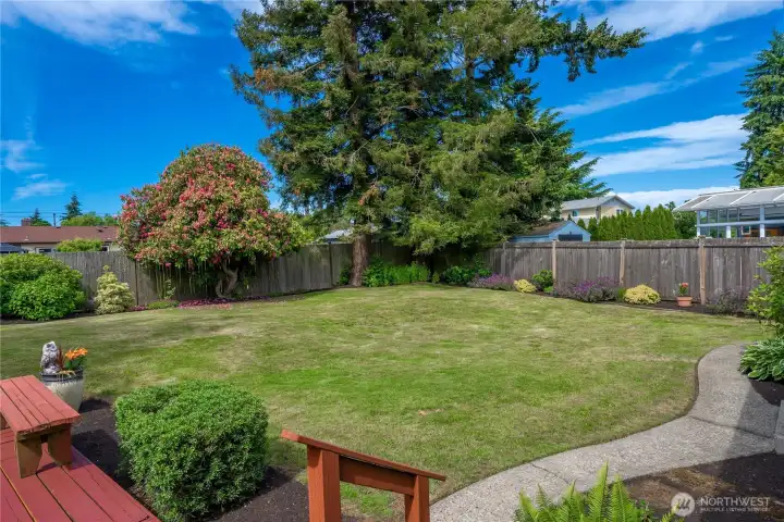 Beautiful, mature landscaping offers easy maintenance and timeless appeal.