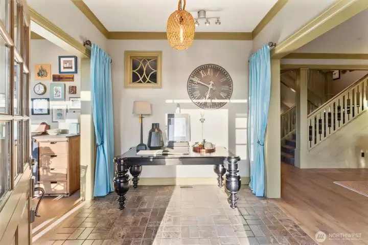 From the moment you enter, it’s clear this residence is something extraordinary. A charming Dutch-door entry, tumbled tile flooring, and thoughtfully curated designer finishes set the tone for a home that blends timeless character with elevated living.