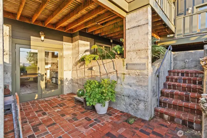 The separate entry to the lower level studio in the main house (Unit #A).