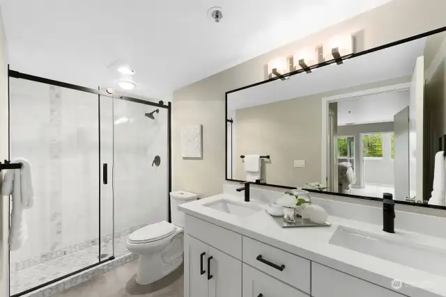 Brand new primary bath with new tile surround, vanity, counters, sinks and more!