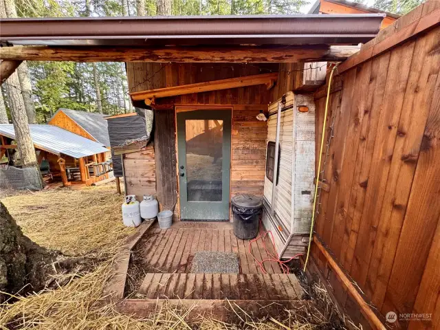 Entrance to the living unit. You can live here while you build your dream home.