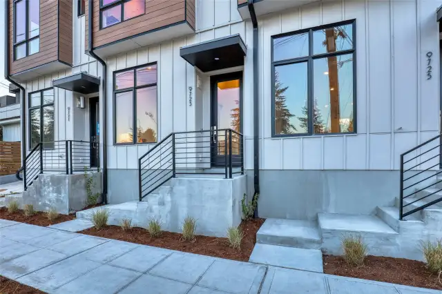 Modern lines and bold architecture welcome you home. This private front entry feels intentional, elevated, and uniquely yours.