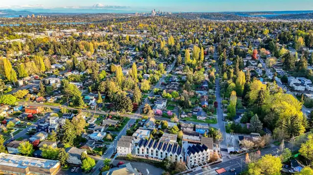 Nestled in the lush heart of Greenwood, your new home offers tree-filled streets, nearby parks, and city skyline views in the distance.