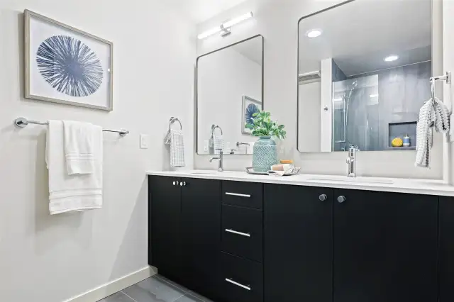 Dual vanities, modern lighting, and room to spread out — this primary bath brings spa energy home.