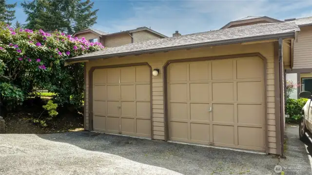 Single car garage. Door on the right with additional parking space in front