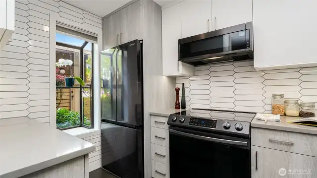 Kitchen remodeled in 2022 with new black stainless appliances