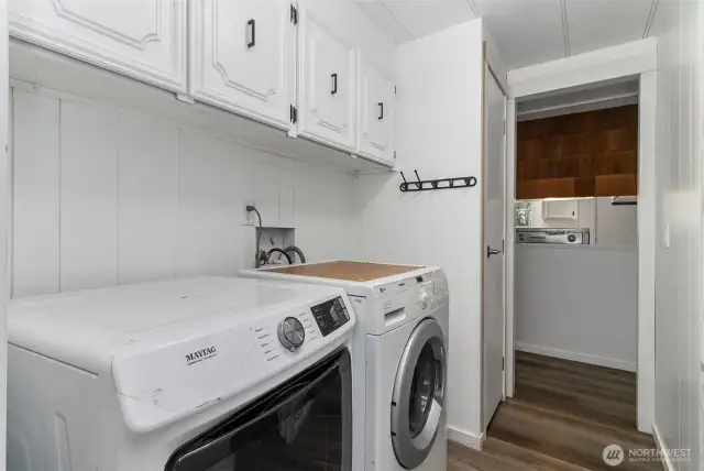 Laundry room with cabinets