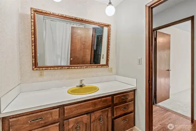 Full guest bath just outside bedroom 2 with EZ access to great room and main living spaces.