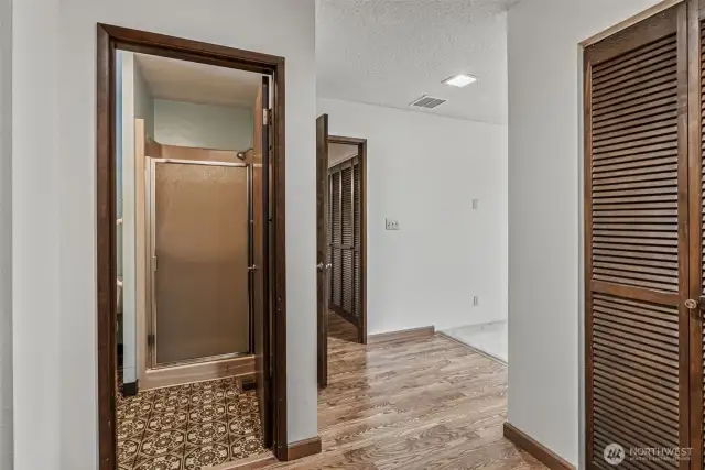 Main suite bath w/private shower/water closet, laminate flooring and plenty of closet/storage space!