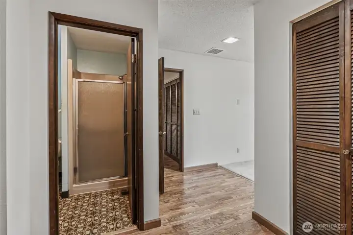 Main suite bath w/private shower/water closet, laminate flooring and plenty of closet/storage space!