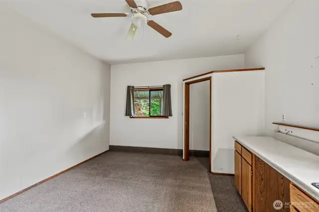 Unexpected guest space, partial bath & built-ins to house mini-kitchenette.