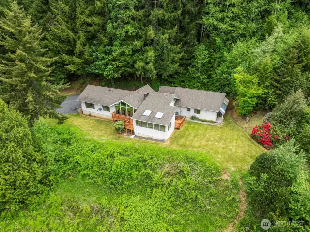 Birdseye view of the pretty home and grounds.
