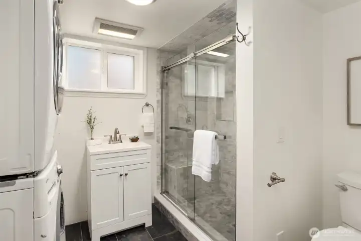 Lower level 3/4 bath with full size washer and dryer