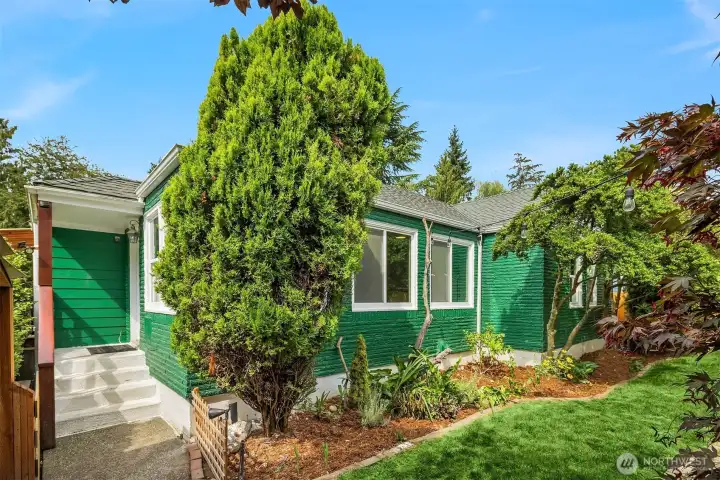 Front entry within the fully fenced front yard