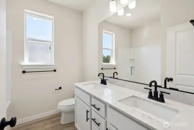Photos are a completed home of the same floorplan.
