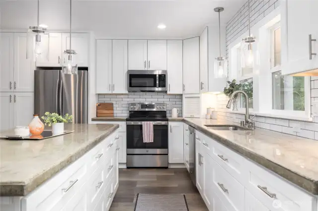 Yes, it's really this big!  And yes, there's a ton of storage!  Soft close doors and drawers, deep storage drawers, appliance garage, built-in pantry w/pull-out drawers.