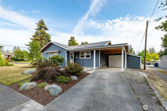 Home has been updated inside and out, including cement board (Hardie type) siding, finished soffits w/lighting, a new (2020) roof and solar, all new vinyl windows, new door, recent exterior paint, new landscaping, fresh patio coating...what's not to love here?