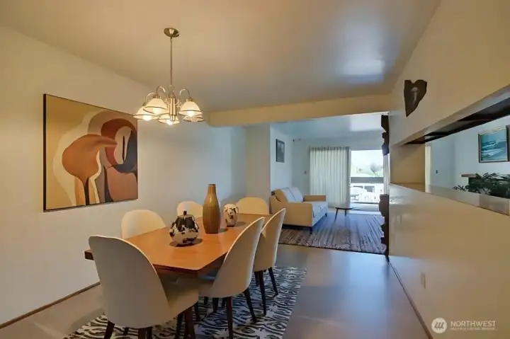Dining area virtually staged.