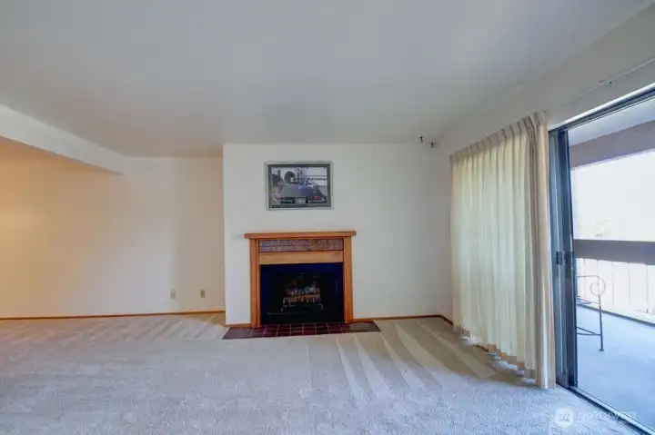 Living room with sliding doors to the balcony.