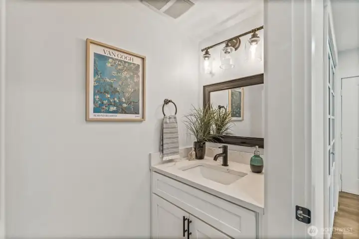 A stylish main-floor powder room for guests
