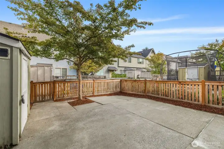 Fenced patio for BBQs, playtime, or twinkling lights
